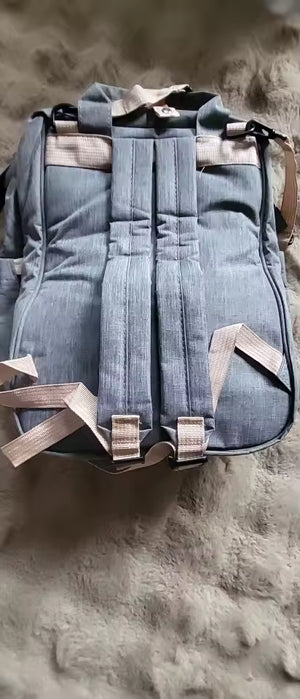 mochila gris asas.avif
